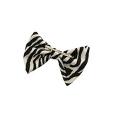Zebra patterned bow tie on a white background