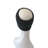 Black beanie on a mannequin head against a white background