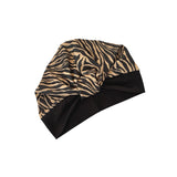 Turban with zebra pattern on a white background