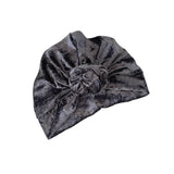 Gray velvet turban with a knot on a white background
