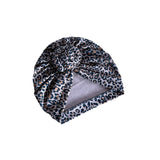 Leopard print headscarf on a white background