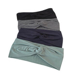 Set of three headbands in black, gray, and green on a white background