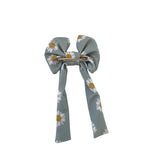 Hair bow with floral pattern on a white background