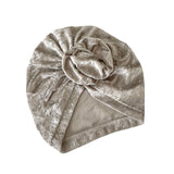 Silver velvet turban on a white background