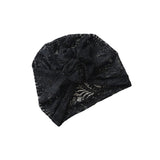 Black glittery beanie on a white background