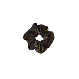 Scrunchie with feather pattern on a white background
