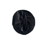 Black knit beret on a white background