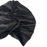 Black textured fabric on a white background