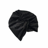 Black knit turban on a white background