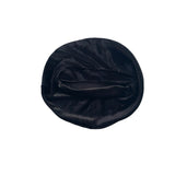 Black velvet hat on a white background