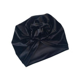 Black turban on a white background