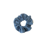 Blue scrunchie on a white background