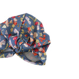 Floral patterned headscarf on a white background