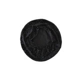Black floral-patterned headband on a white background