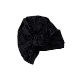 Black patterned headscarf on a white background