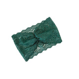 Green lace headband on a white background
