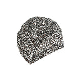 Leopard print headscarf on a white background