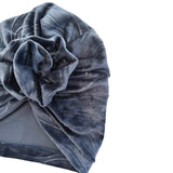 Blue velvet turban on a white background