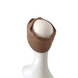 Brown knit balaclava on a white mannequin head against a white background