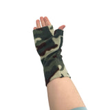 Camouflage fingerless gloves worn on a white background