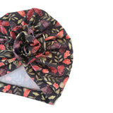 Floral patterned headscarf on a white background