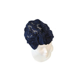 Navy blue lace headband on a white mannequin head against a white background