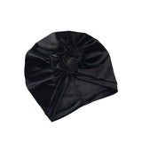 Black satin turban on a white background