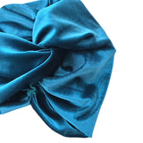 Blue fabric with a bow on a white background