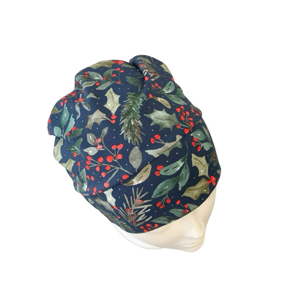 Navy blue headscarf with green leaves and red berries on a white background