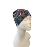 Floral patterned beanie on a mannequin head against a white background