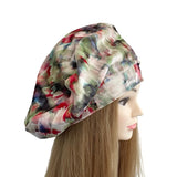 Colorful patterned headscarf on a mannequin head with long hair against a white background ireland
