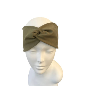 Four colorful headbands arranged in a row on a white background