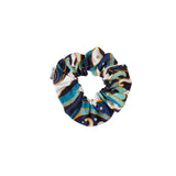 Colorful scrunchie with abstract pattern on a white background