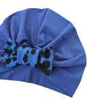 Blue turban with a decorative bow on a white background ireland