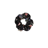 Floral patterned scrunchie on a white background