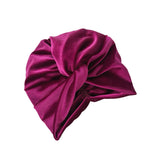 Purple headscarf with a knot on a white background