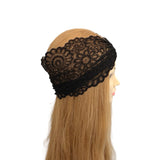 Black lace headband on a mannequin head with blonde hair against a white background