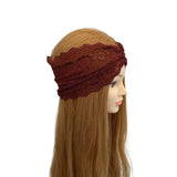 Brown knitted headband with lace detail on a mannequin head against a white background