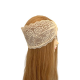 Lace headband on a mannequin head with long brown hair against a white background