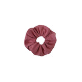 Mauve scrunchie on a white background