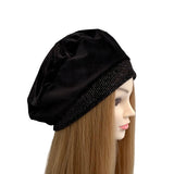 Black satin headband on a mannequin head with long brown hair against a white background