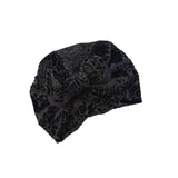 Black patterned headscarf on a white background