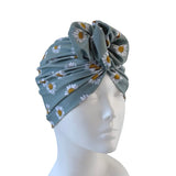 Floral headscarf on a mannequin head against a white background ireland