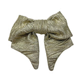 Gold zig zag patterned oversized hair bow 