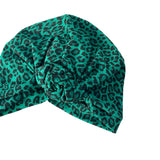 Green leopard print headscarf on a white background