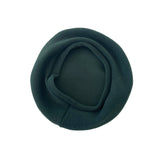 Dark green beret on a white background