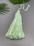 green tassel charm