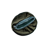 Dark green velvet headband on a white background
