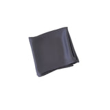 Dark gray fabric square on a white background