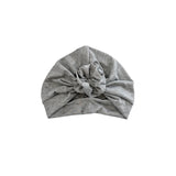 Gray turban hat on a white background